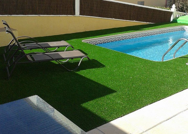 artificial grass around a pool area